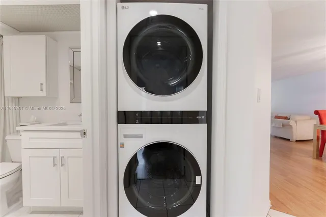 a close view of a utility room with washer and dryer