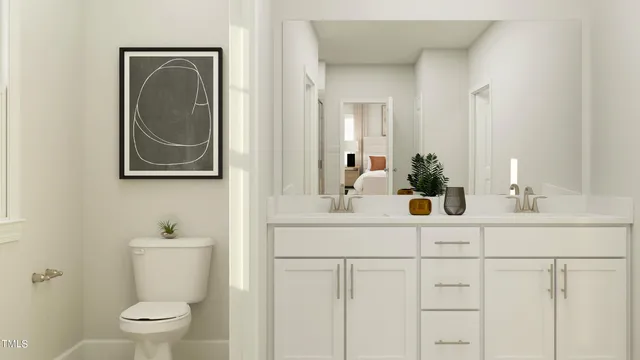 a bathroom with a toilet and a sink