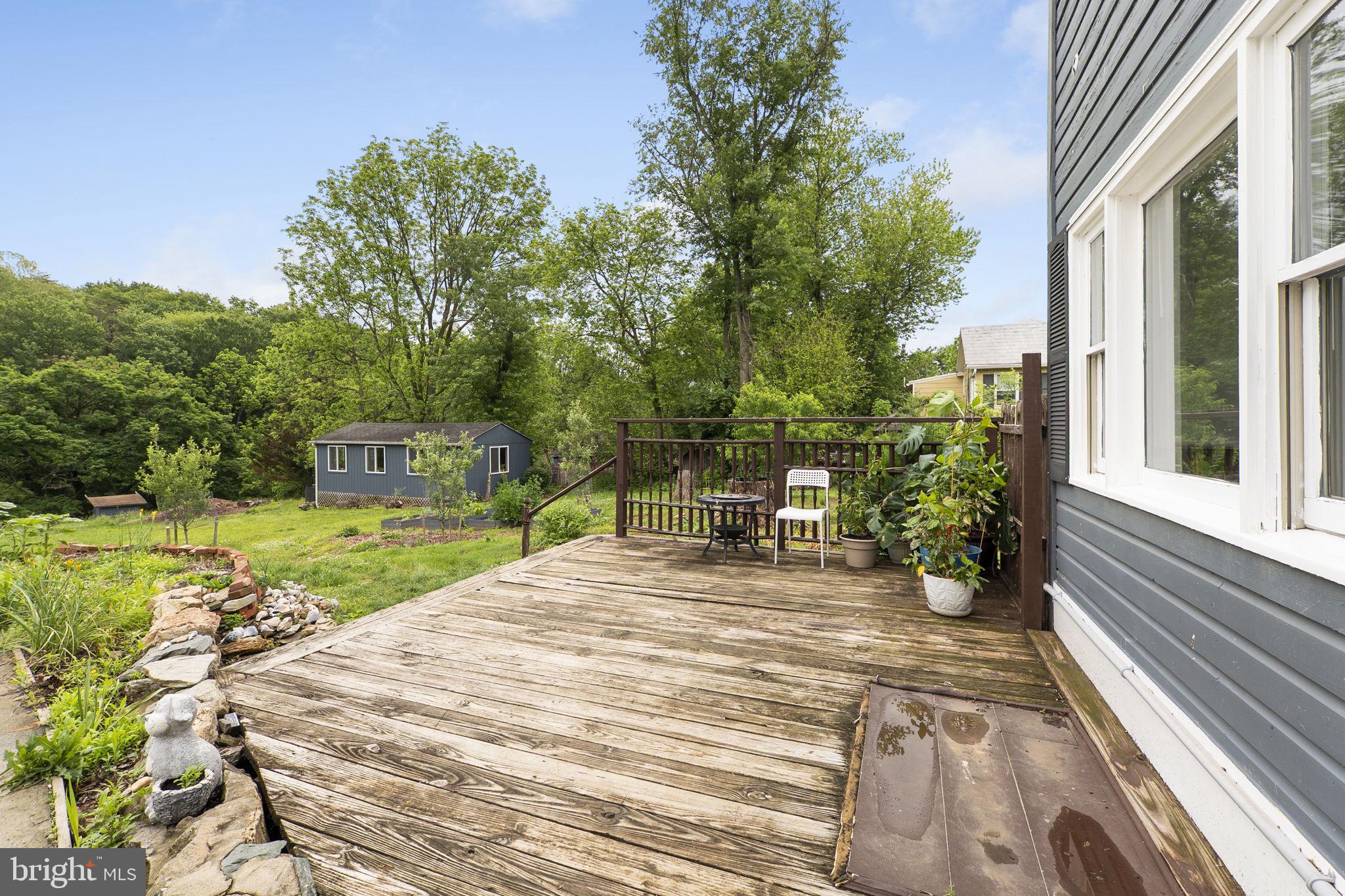 26001 Frederick Road Clarksburg, MD 20871 - Photo 37 of 46 a view of a house with backyard and sitting area