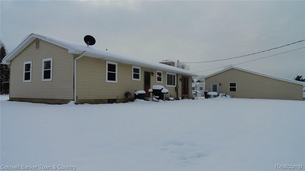 4696 North Nicholson Road Fowlerville, MI 48836 - Photo 31 of 42 Rear of Home and Garage.JPG