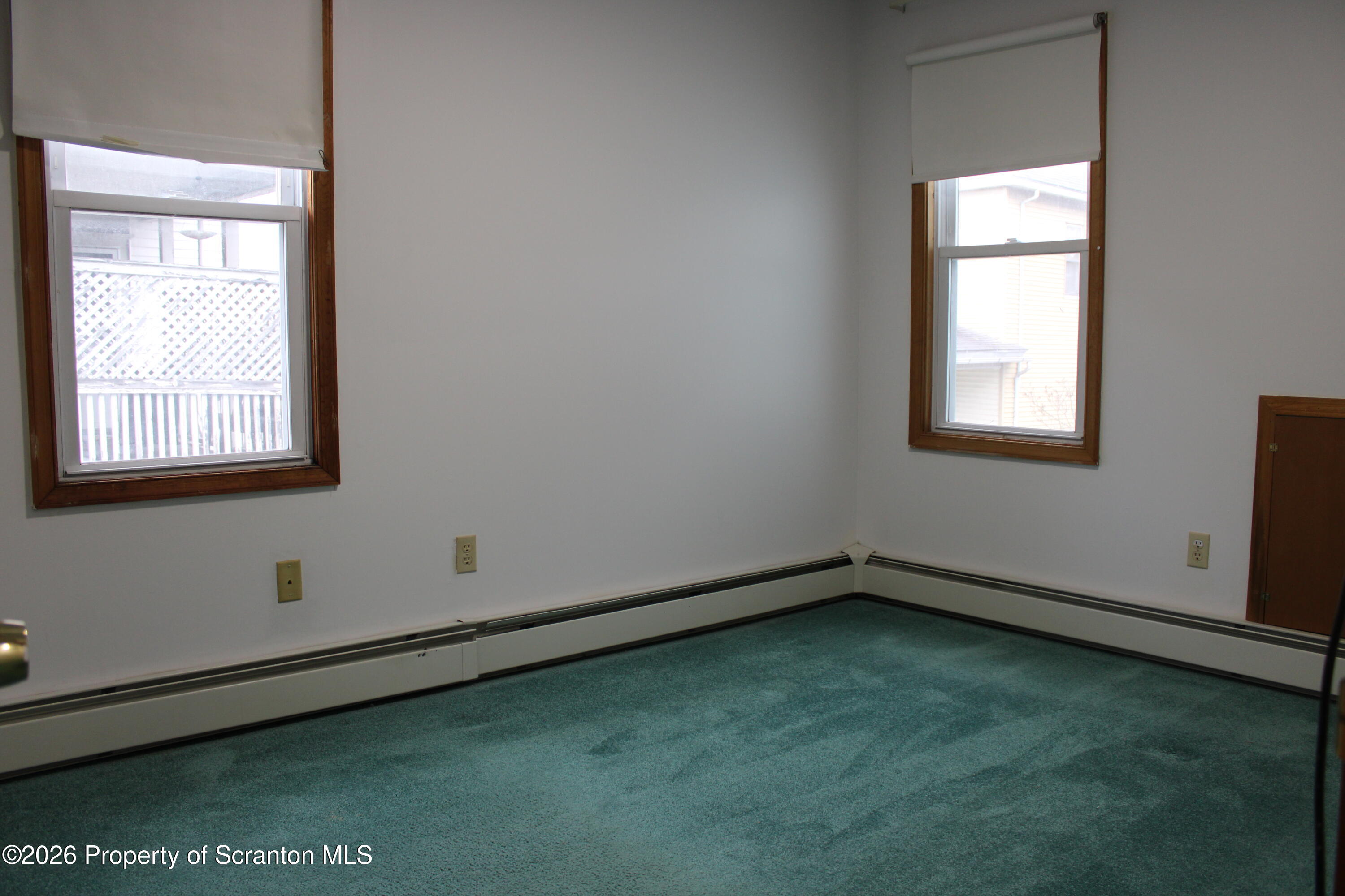 1329-1331 Oram Street Scranton, PA 18504 - Photo 11 of 29 an empty room with a window