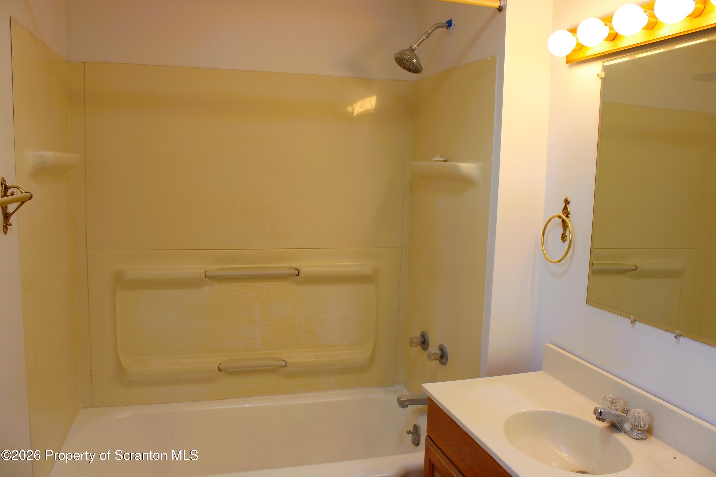 1329-1331 Oram Street Scranton, PA 18504 - Photo 22 of 29 a bathroom with a shower and a sink