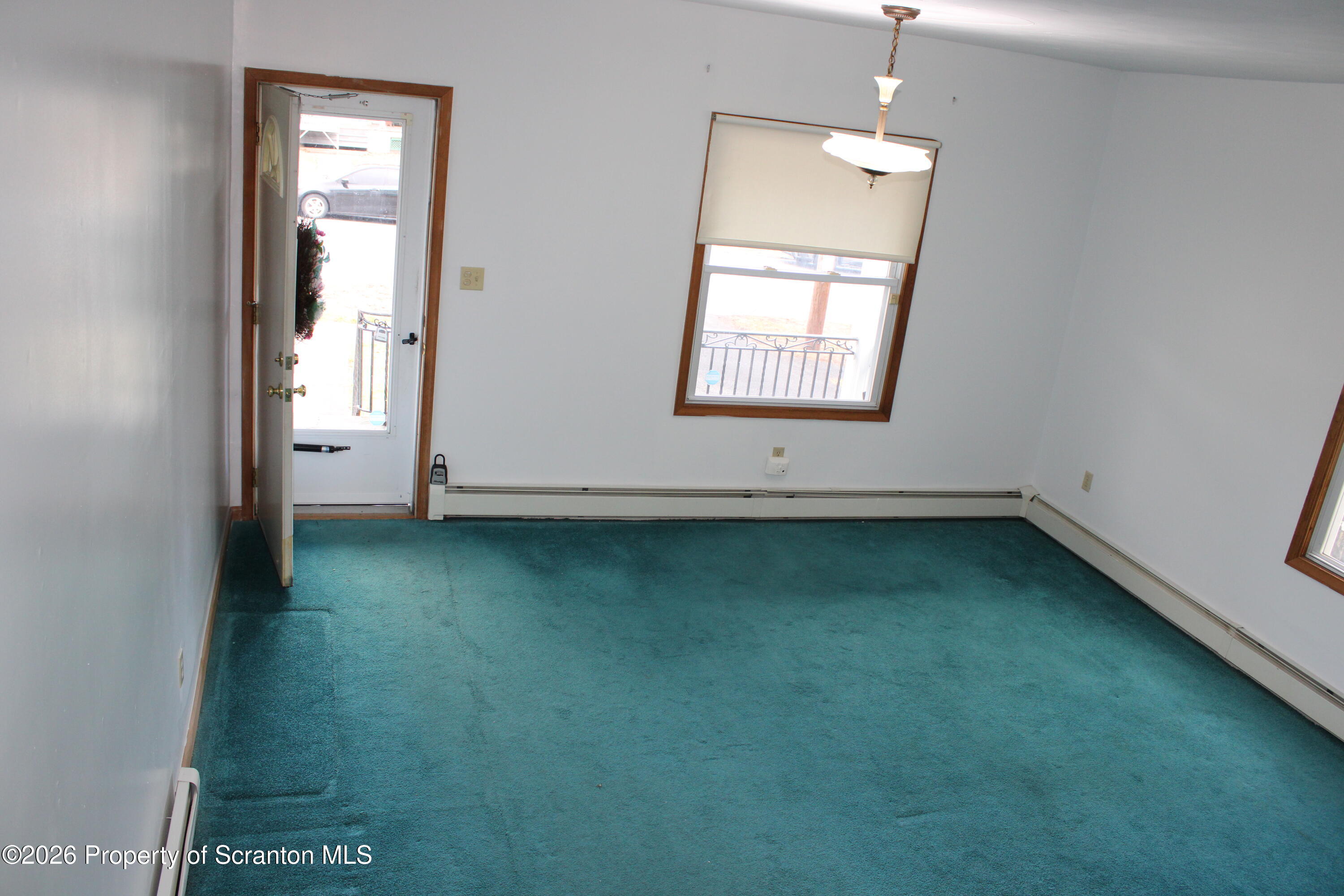 1329-1331 Oram Street Scranton, PA 18504 - Photo 8 of 29 an empty room with a window