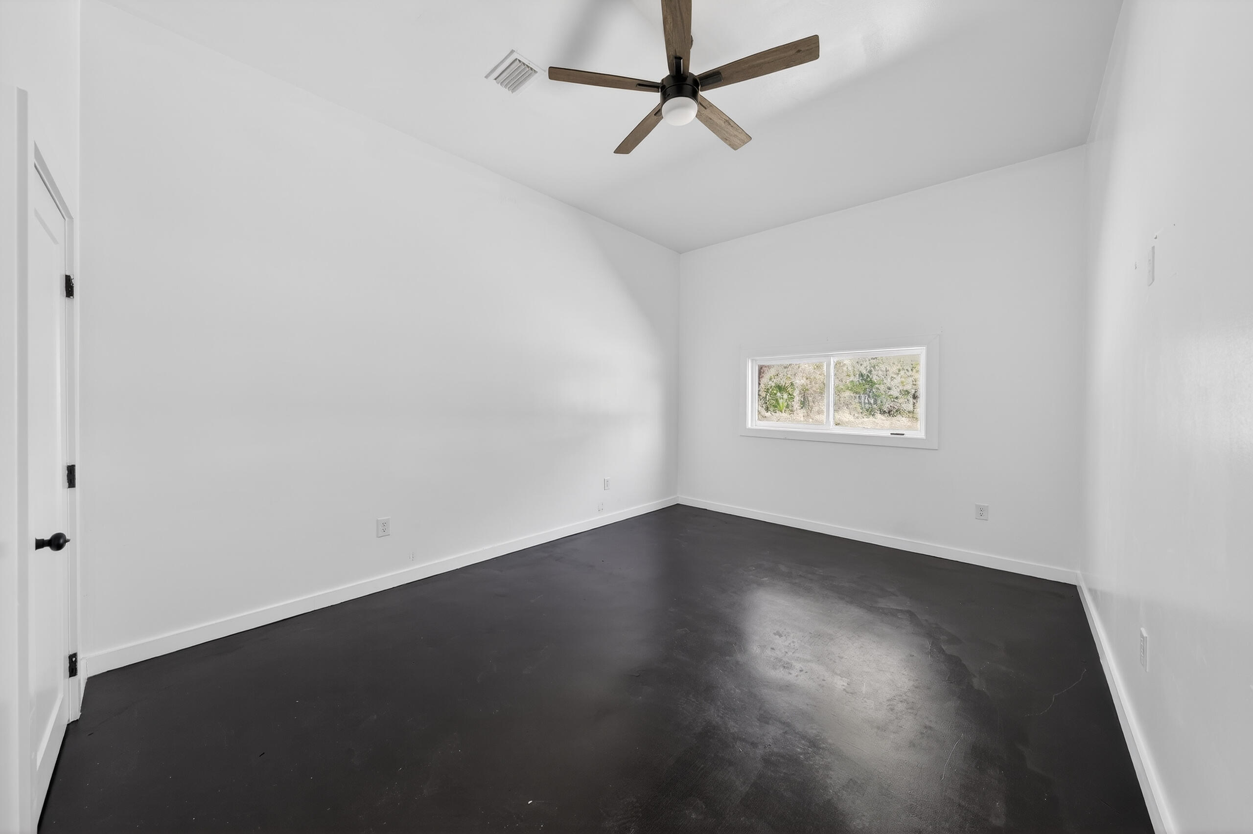 837 Cardinal Street Fort Walton Beach, FL 32547 - Photo 34 of 44 a view of an empty room with a window