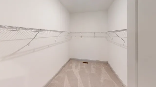 a view of a room with racks on the wall