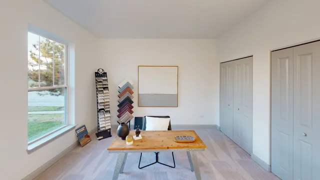 a room with furniture and a window