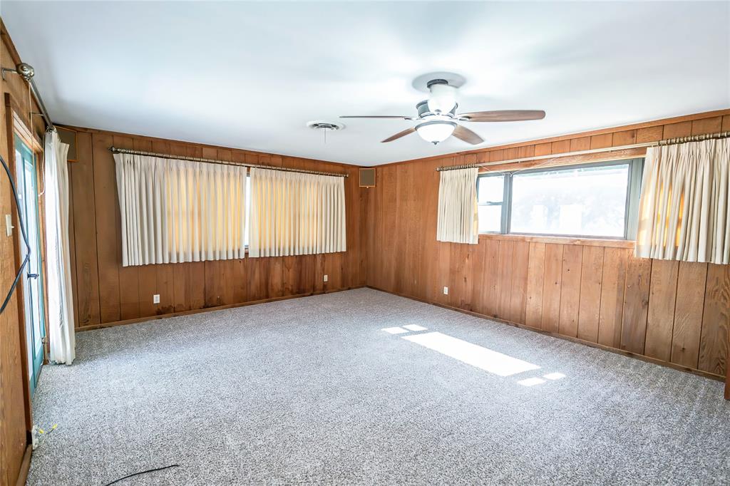 722 Storey Road Nocona, TX 76255 - Photo 17 of 40 a view of an empty room with a window