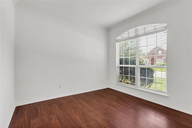 a kitchen with stainless steel appliances granite countertop a stove a sink dishwasher a refrigerator and a microwave oven