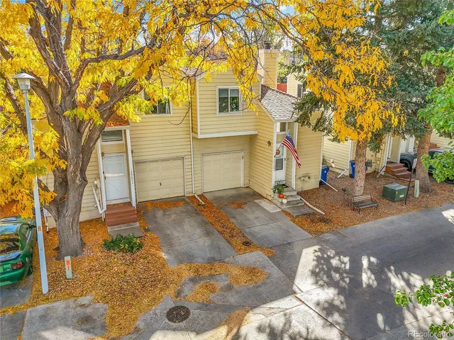 front view of a house with a trees