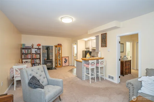 a living room with furniture and a table