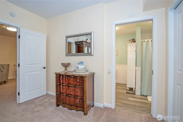 a view of room with window and bathroom