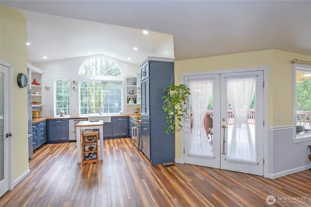 a view of a livingroom with furniture window and wooden floor