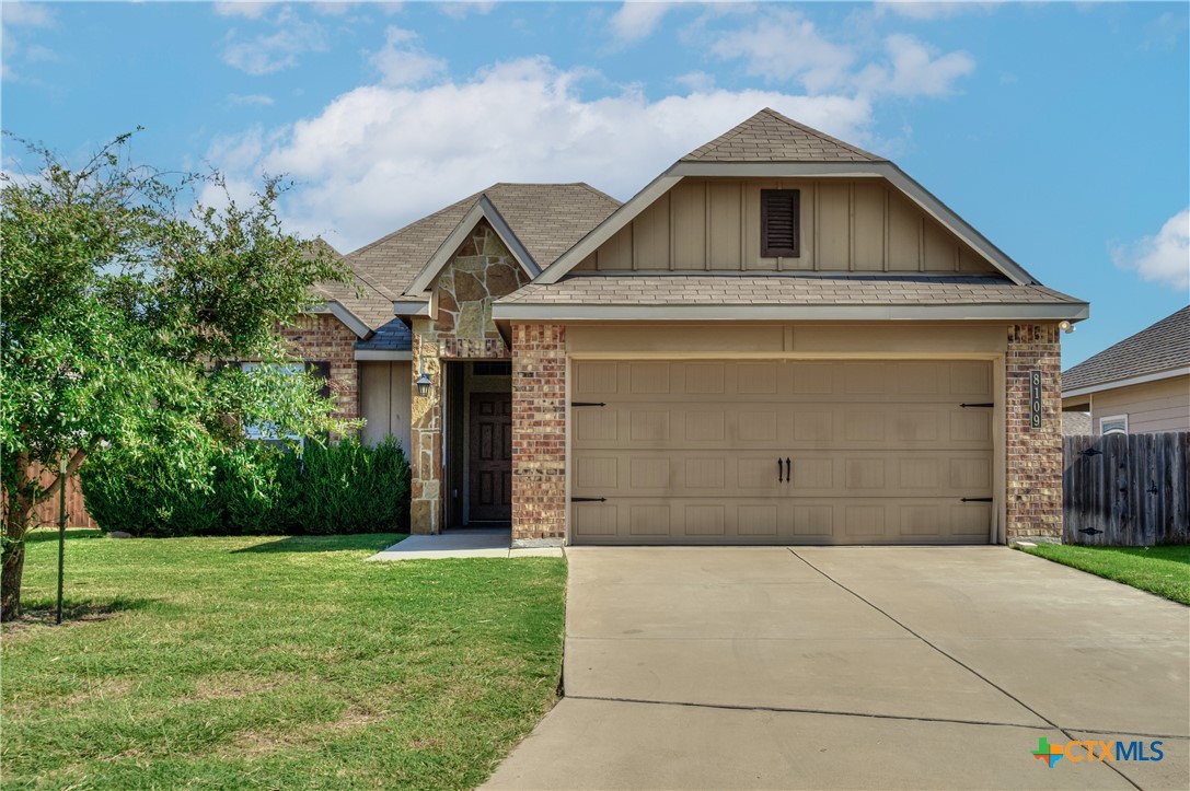 8109 Northgate Loop Temple, TX 76502 - Photo 1 of 35 a front view of a house with a yard and garage