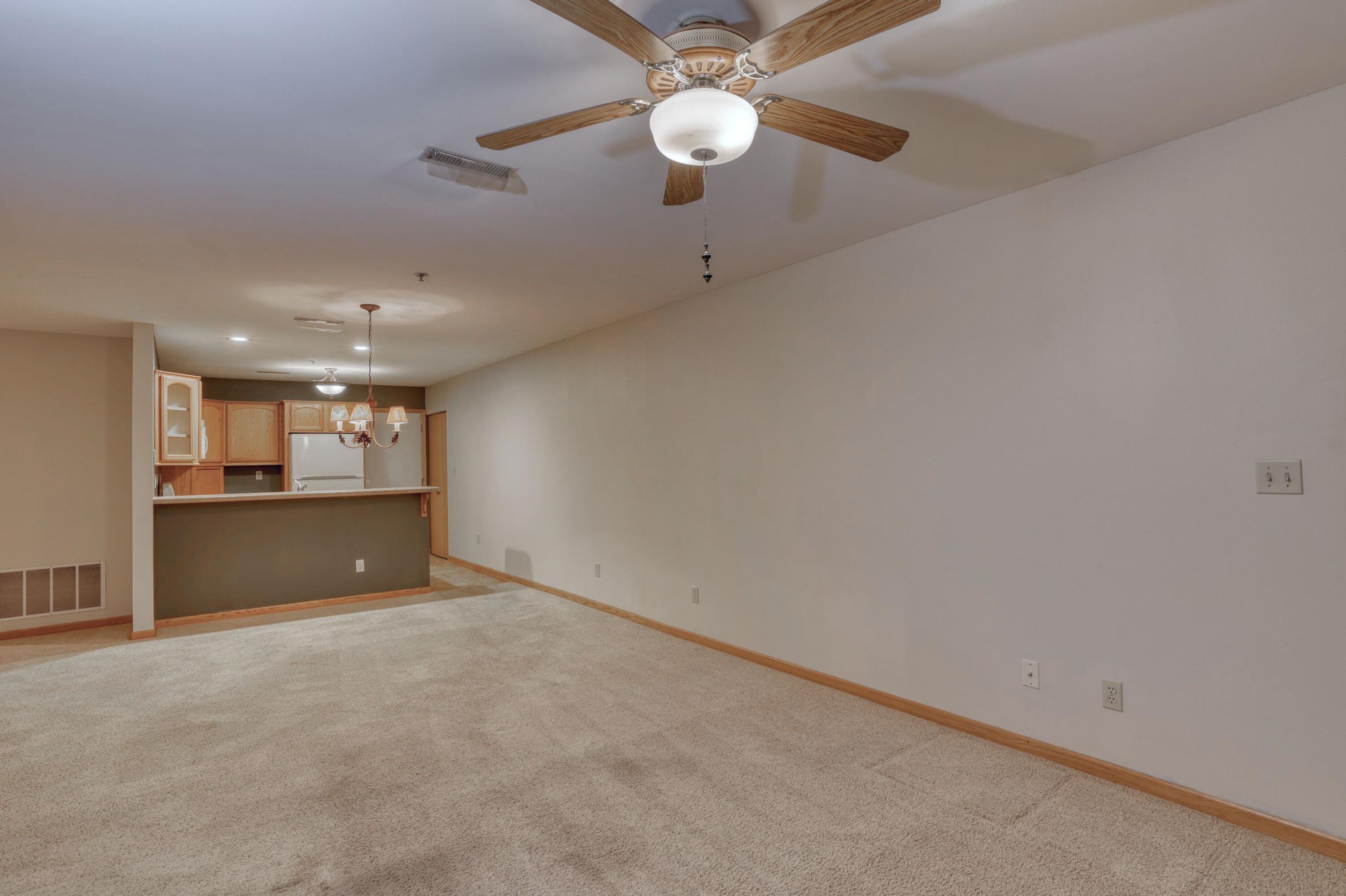 18275 Brookfield Lake Drive, Unit 93 Brookfield, WI 53045 - Photo 4 of 25 Main Room to Kitchen