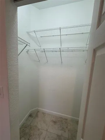 a view of small space with racks on the wall