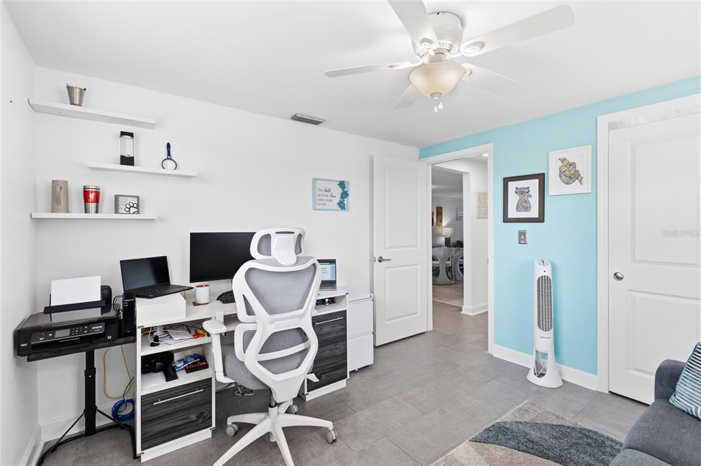4467 Rustic Drive New Port Richey, FL 34652 - Photo 21 of 44 a view of a kitchen with furniture and wooden floor