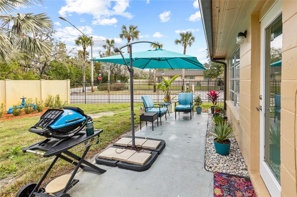 4467 Rustic Drive New Port Richey, FL 34652 - Photo 26 of 44 a view of a swimming pool and lounge chairs
