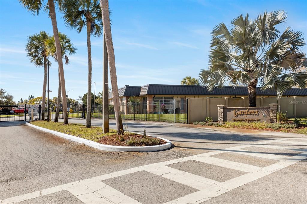 4467 Rustic Drive New Port Richey, FL 34652 - Photo 29 of 44 a swimming pool with outdoor seating and yard