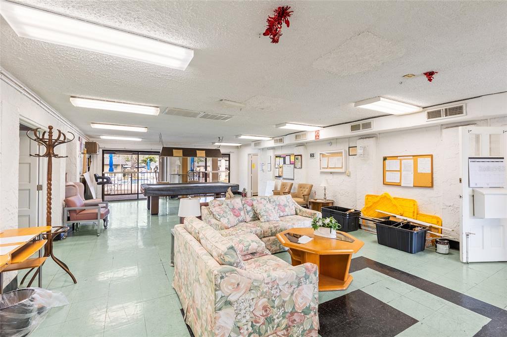 4467 Rustic Drive New Port Richey, FL 34652 - Photo 31 of 44 a living room with furniture and a wooden floor