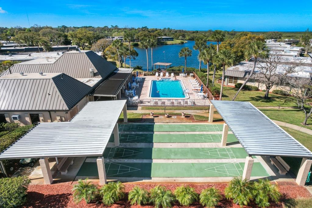 4467 Rustic Drive New Port Richey, FL 34652 - Photo 33 of 44 an aerial view of a house with a ocean view