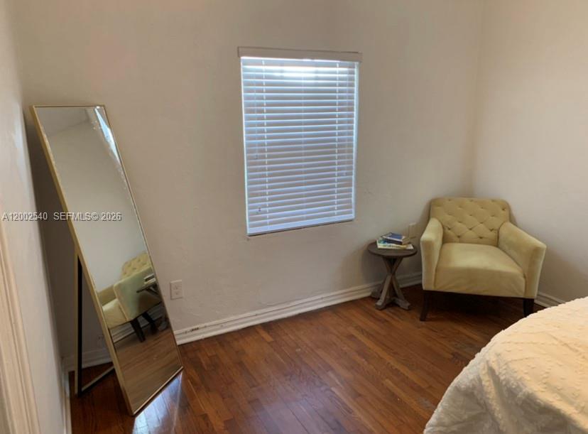 4619 Southwest 10th Street Miami, FL 33134 - Photo 20 of 30 a living room with furniture and a window