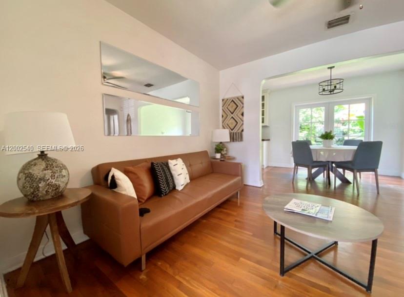 4619 Southwest 10th Street Miami, FL 33134 - Photo 8 of 30 a living room with furniture and a large window