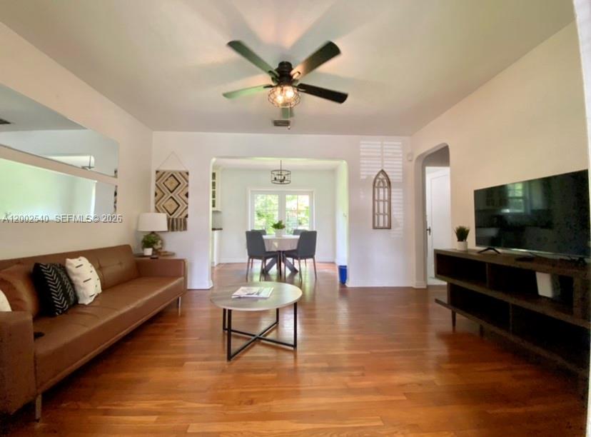 4619 Southwest 10th Street Miami, FL 33134 - Photo 9 of 30 a living room with furniture and a flat screen tv