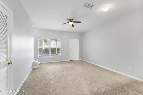 an empty room with windows