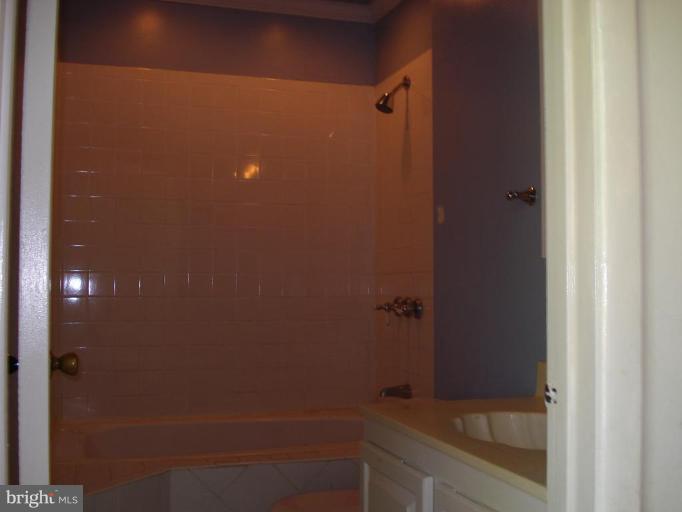 9072 Centerway Road Gaithersburg, MD 20879 - Photo 12 of 15 a bathroom with a shower