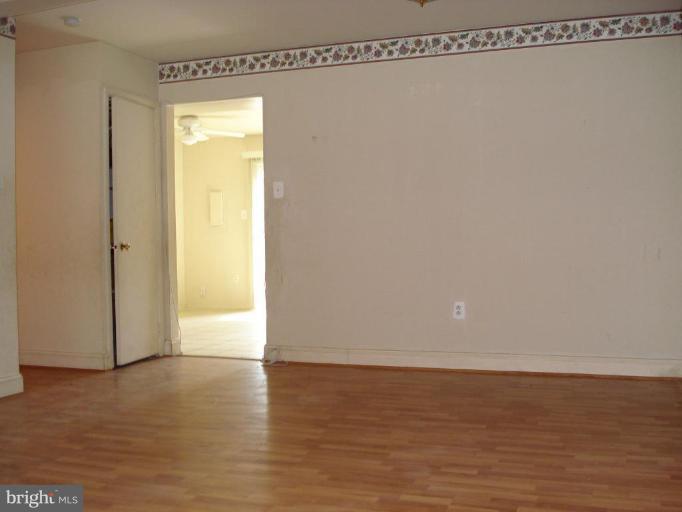 9072 Centerway Road Gaithersburg, MD 20879 - Photo 4 of 15 a view of a room with an empty space