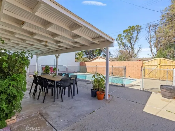 a view of a tables and chairs in patio