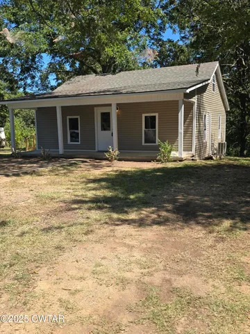 a view of a house with a swimming pool