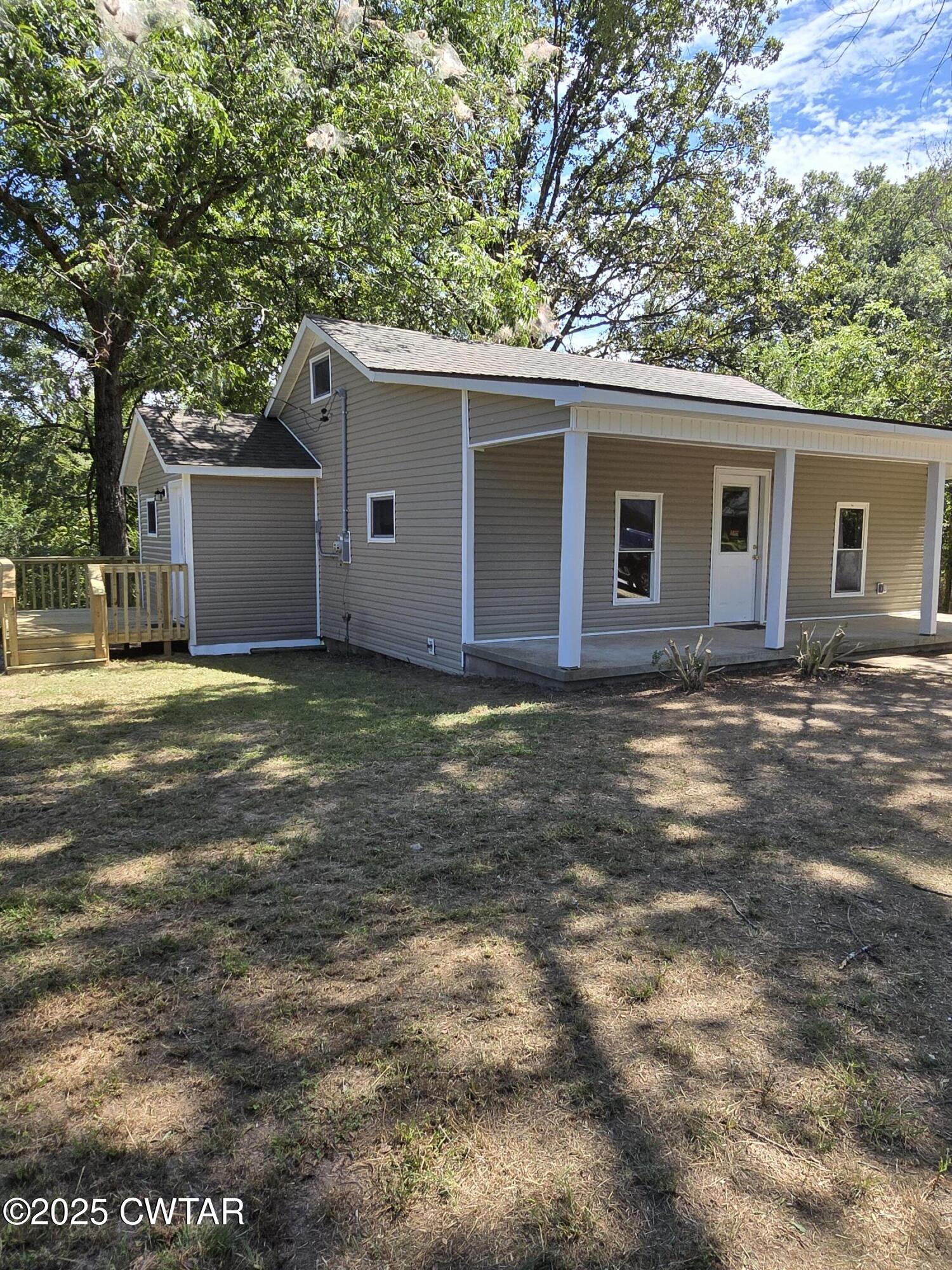 45 Lesters Chapel Road Jackson, TN 38301 - Photo 2 of 16 a view of a house with a yard