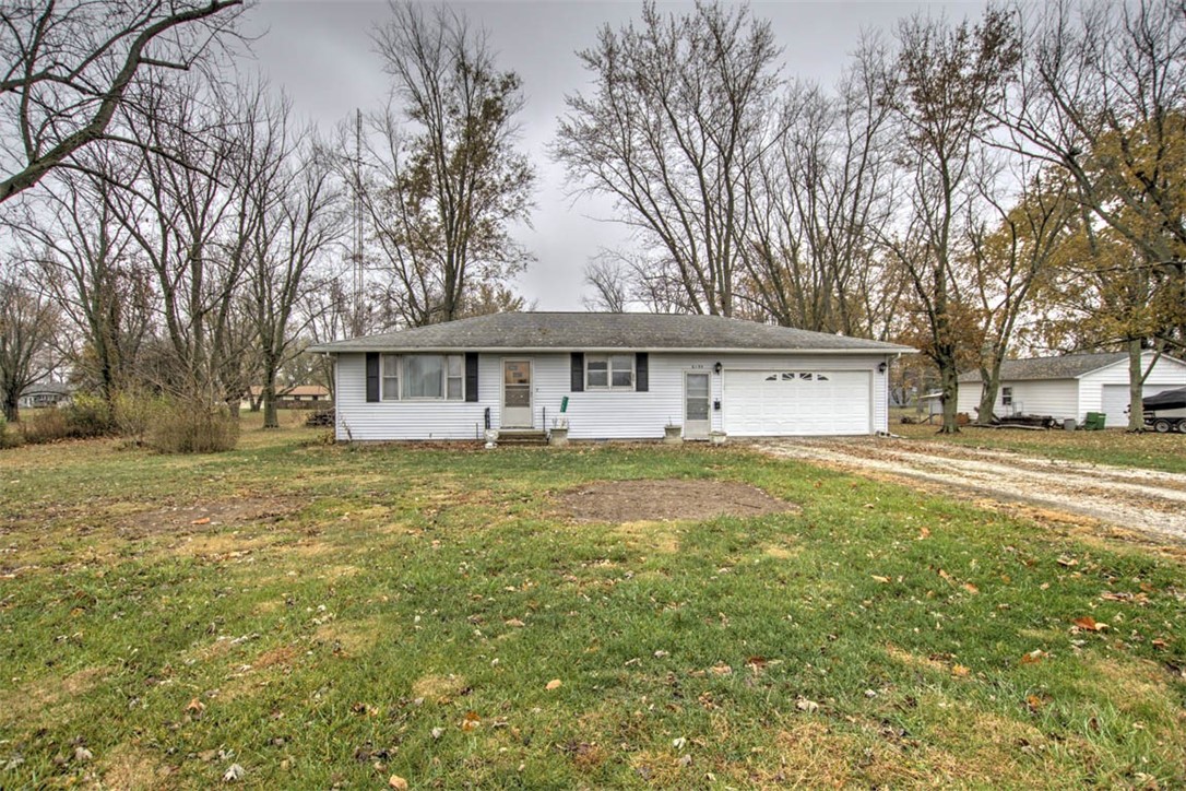 6155 Camp Warren Road Decatur, IL 62521 - Photo 1 of 18 a view of a house with a yard and large tree