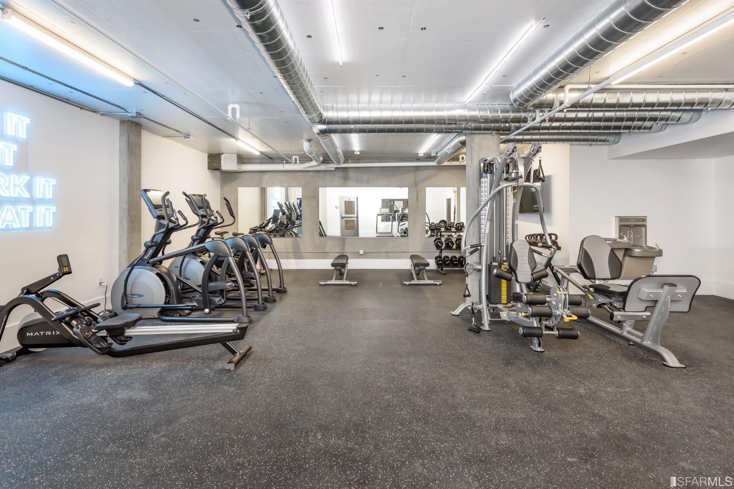 1288 Howard Street, Unit 403 San Francisco, CA 94103 - Photo 25 of 33 a view of a room with gym equipment