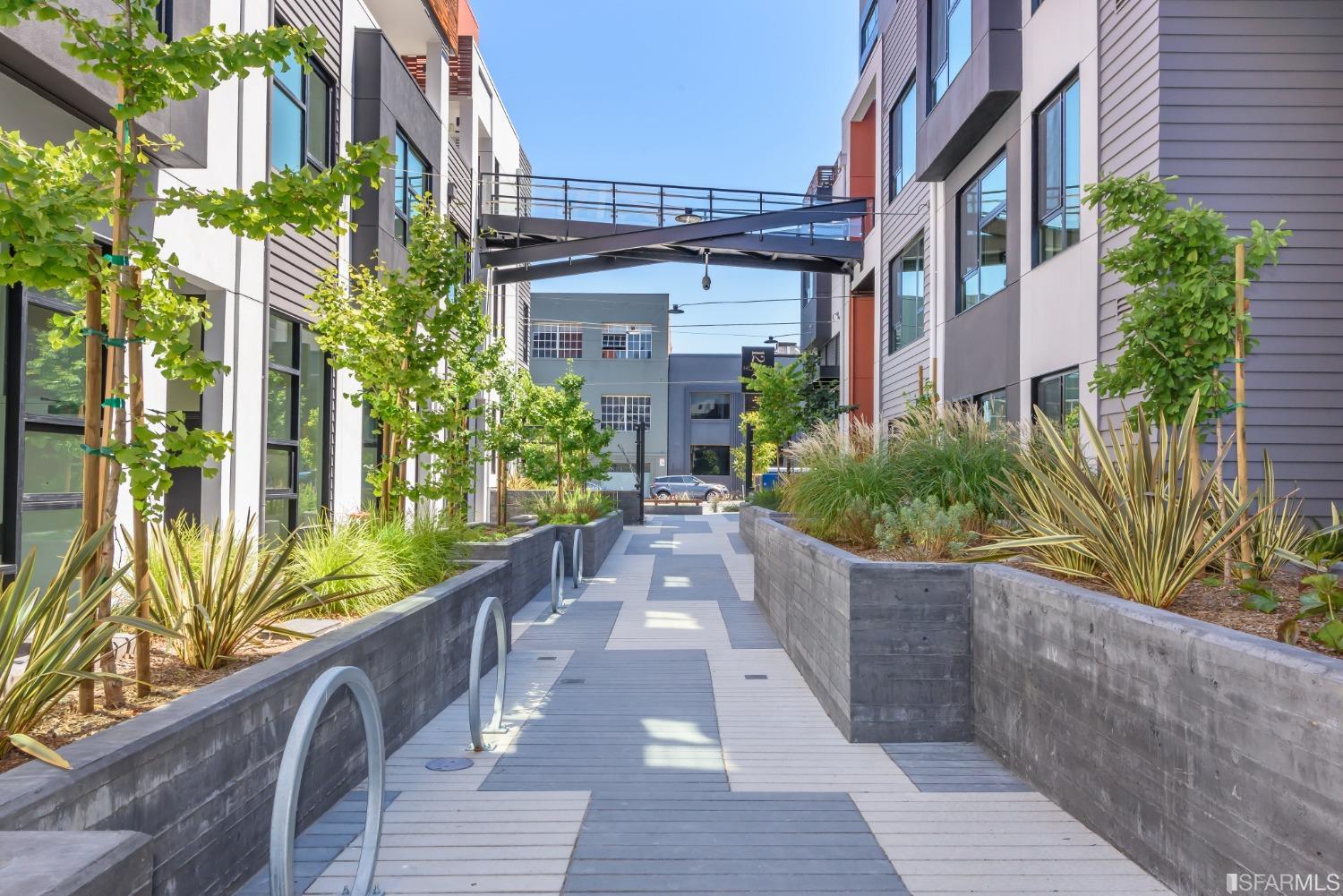 1288 Howard Street, Unit 403 San Francisco, CA 94103 - Photo 31 of 33 a view of a garden with pathway