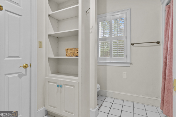 2115 Cumberland Lane Albany, GA 31707 - Photo 22 of 47 a view of an empty room with cabinet and a window