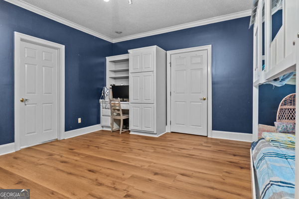 2115 Cumberland Lane Albany, GA 31707 - Photo 24 of 47 a bedroom with a bed and a tv