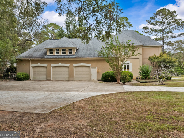 2115 Cumberland Lane Albany, GA 31707 - Photo 43 of 47 a front view of a house with a yard and garage