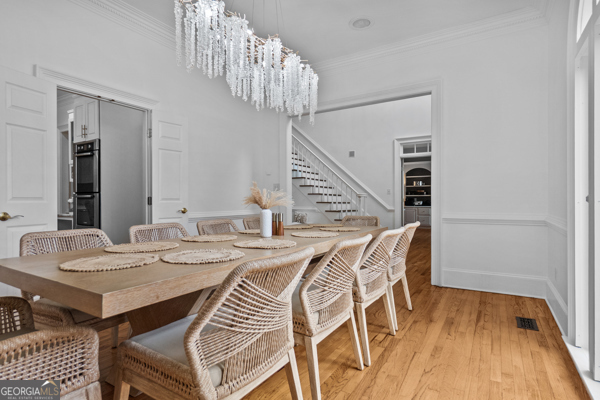 2115 Cumberland Lane Albany, GA 31707 - Photo 10 of 47 a view of a dining room with furniture and wooden floor