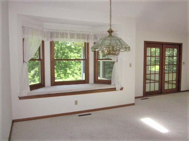 693 Lake Summerset Road Lake Summerset, IL 61019 - Photo 17 of 25 a view of an empty room with a window