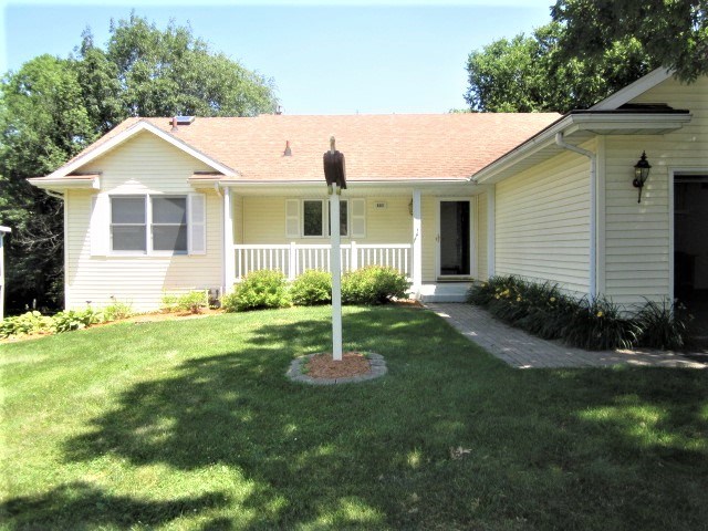 693 Lake Summerset Road Lake Summerset, IL 61019 - Photo 24 of 25 a view of a house with a yard and garden