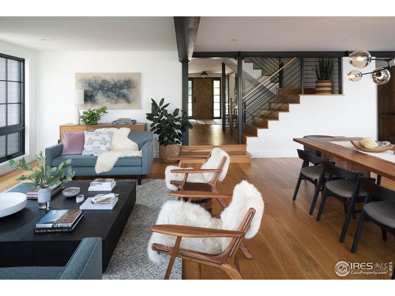 2828 4th Street Boulder, CO 80304 - Photo 2 of 30 a living room with furniture and wooden floor