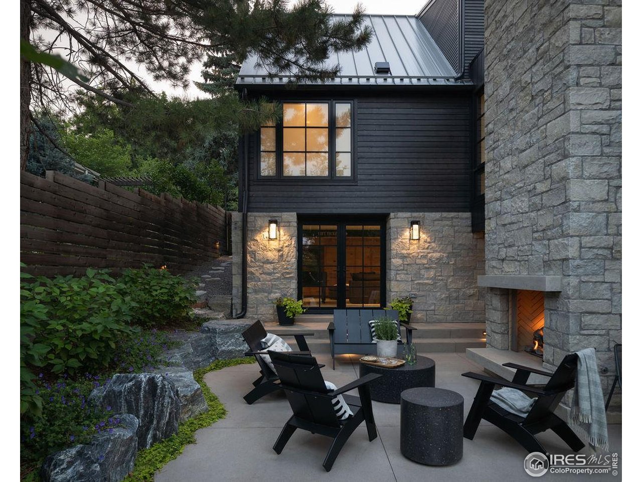 2828 4th Street Boulder, CO 80304 - Photo 23 of 30 a backyard of a house with outdoor seating