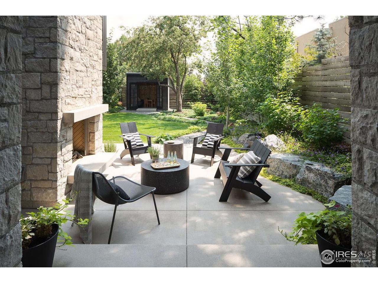 2828 4th Street Boulder, CO 80304 - Photo 29 of 30 a view of a chairs and table in backyard