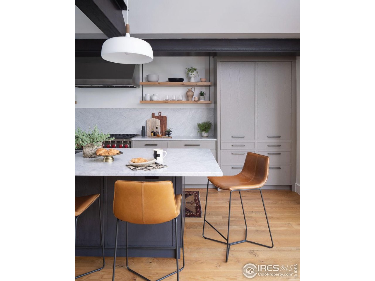 2828 4th Street Boulder, CO 80304 - Photo 4 of 30 a dining room with furniture and a potted plant