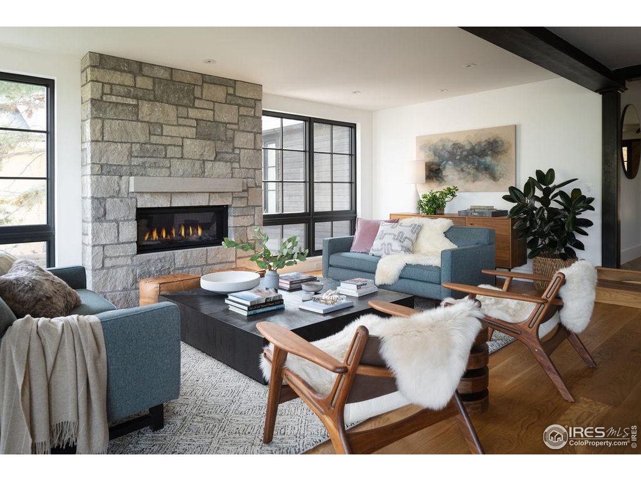 2828 4th Street Boulder, CO 80304 - Photo 7 of 30 a living room with furniture and a fireplace