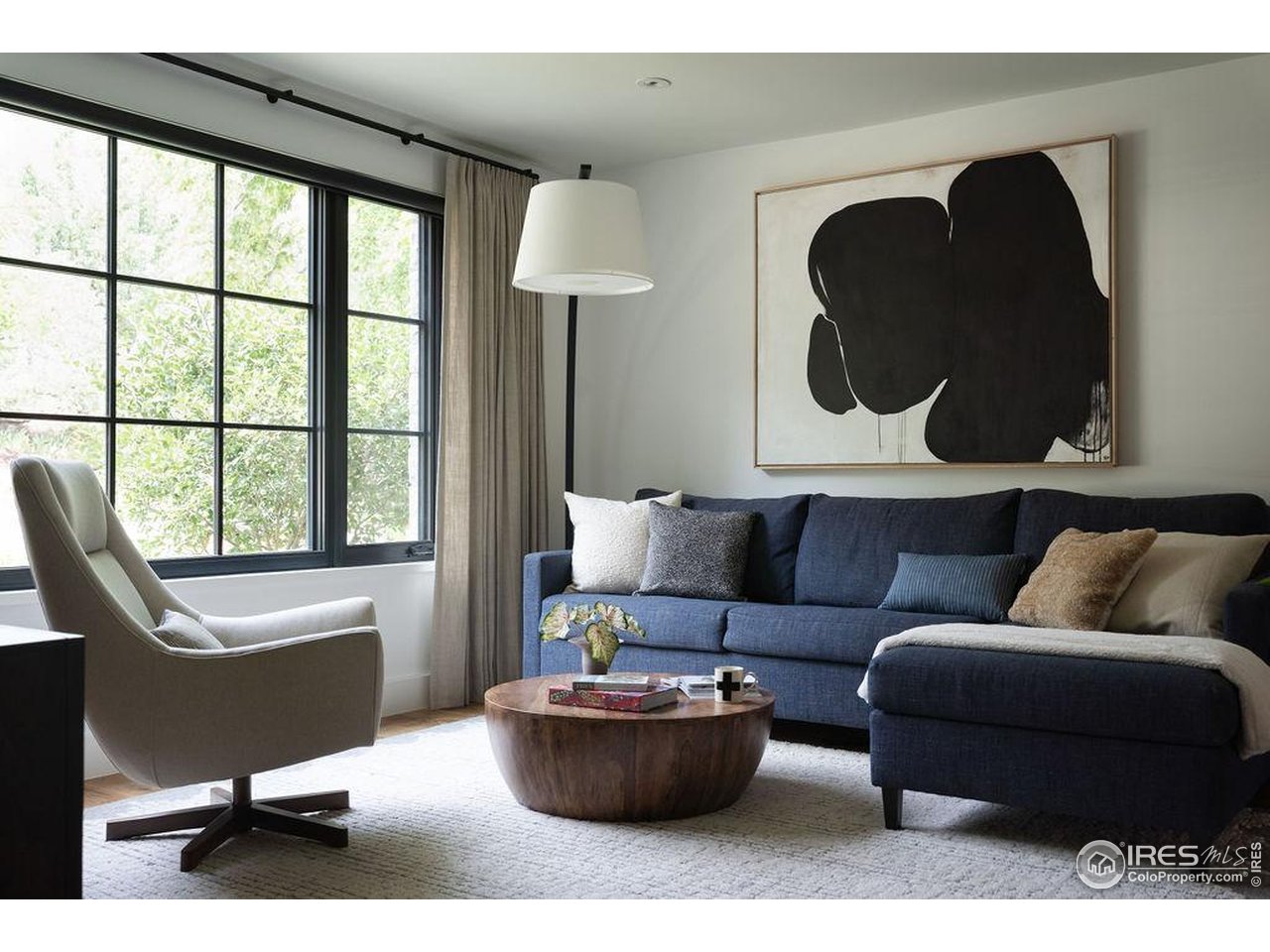 2828 4th Street Boulder, CO 80304 - Photo 9 of 30 a living room with furniture and a large window