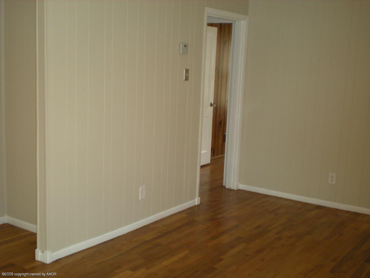 4109 Cline Road Amarillo, TX 79110 - Photo 3 of 11 a view of a small space with wooden floor