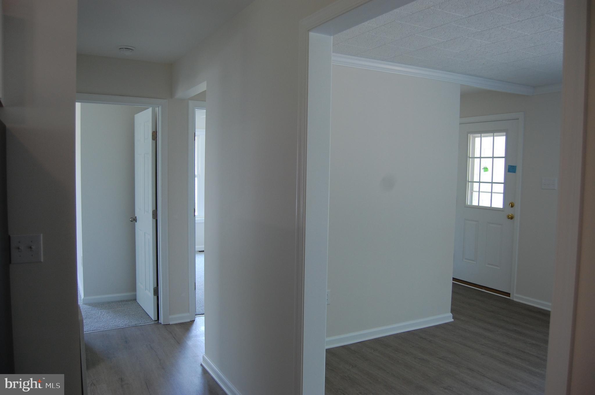 11511 Old School Road Mardela Springs, MD 21837 - Photo 13 of 34 a view of hallway with windows
